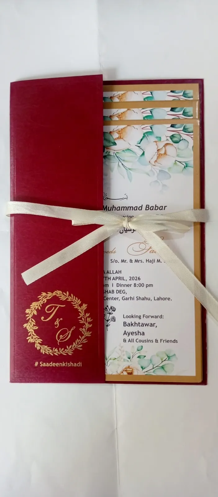 Invitation card design - premium maroon folder with satin ribbon and event inserts