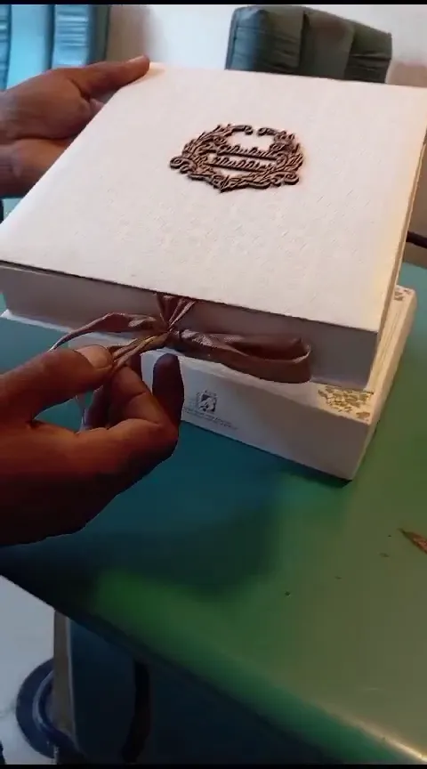 Invitation card in Urdu - box style with satin ribbon and laser-cut emblem