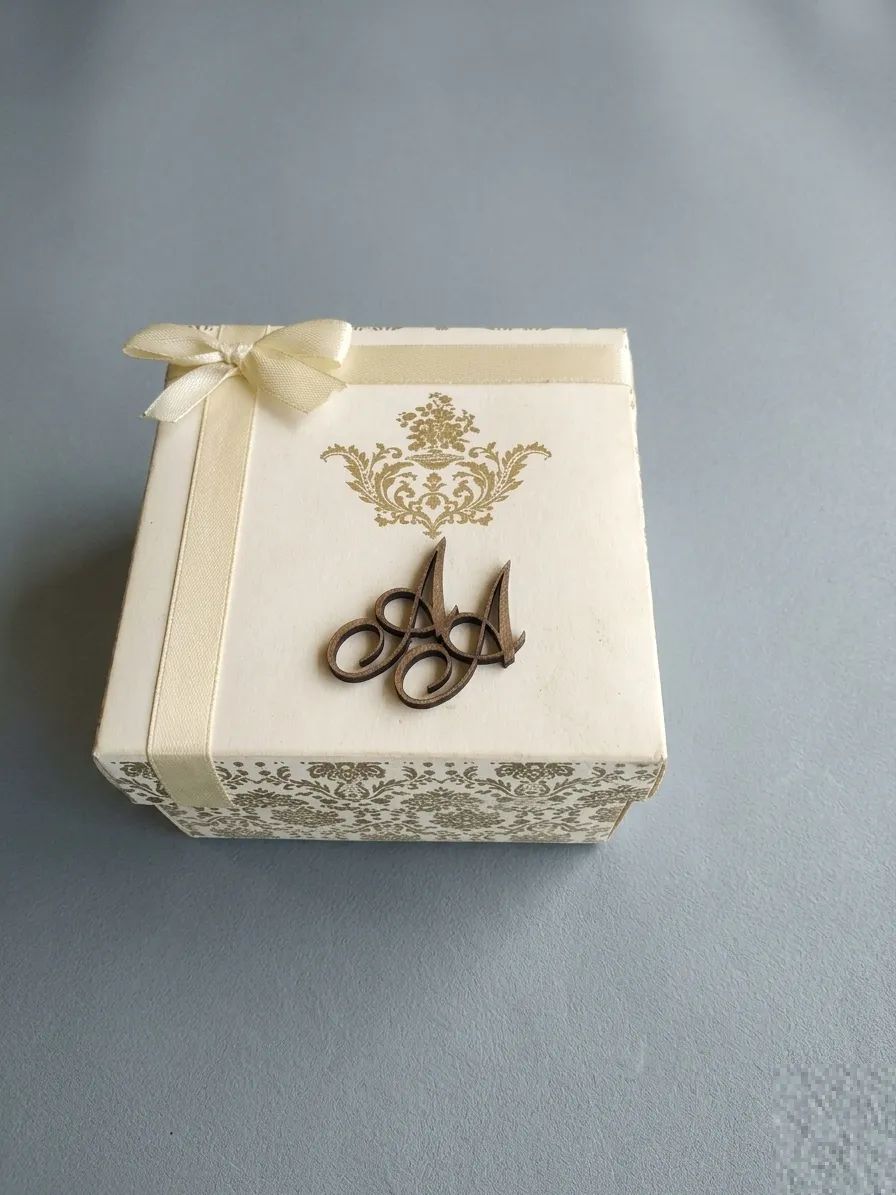 Square Hard Bid Box with gold detailing and ribbon